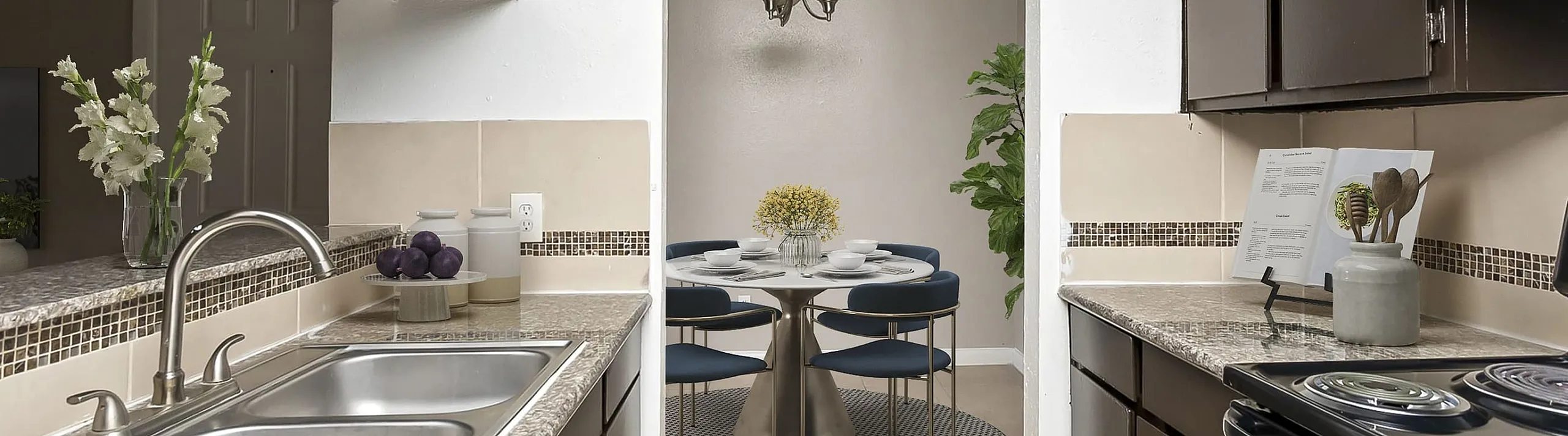 Charming kitchen with elegant countertops leading to a stylish dining area with modern seating, enhanced by natural light and tasteful decor.