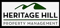 Heritage Hill Property Management logo featuring elegant mountain peak design.