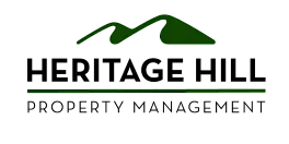Heritage Hill Property Management logo showcasing a sleek, modern design with mountain-inspired elements.
