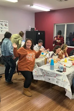 Manager Jen and residents during Thanksgiving event