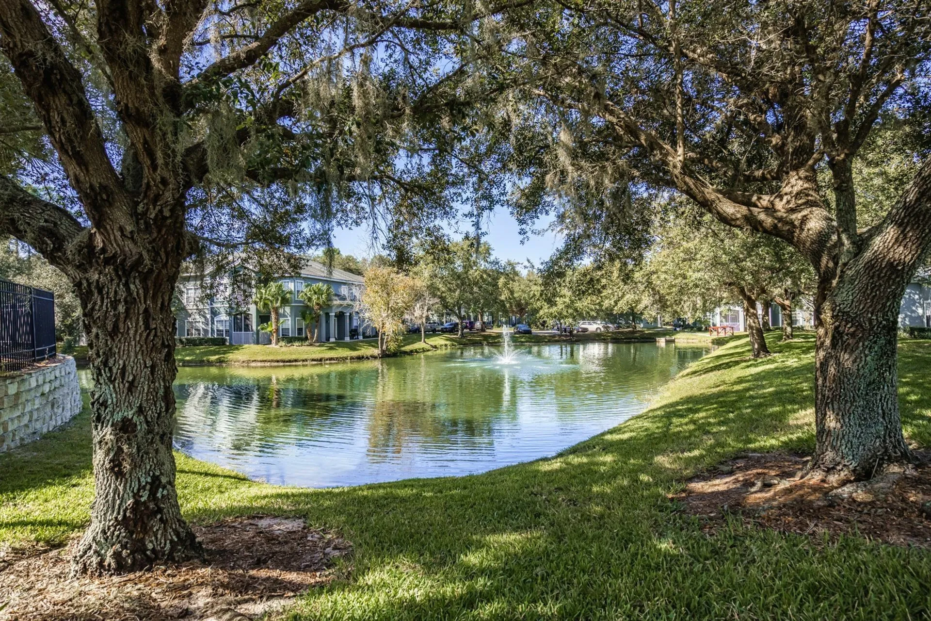 Lake and fountain with trees