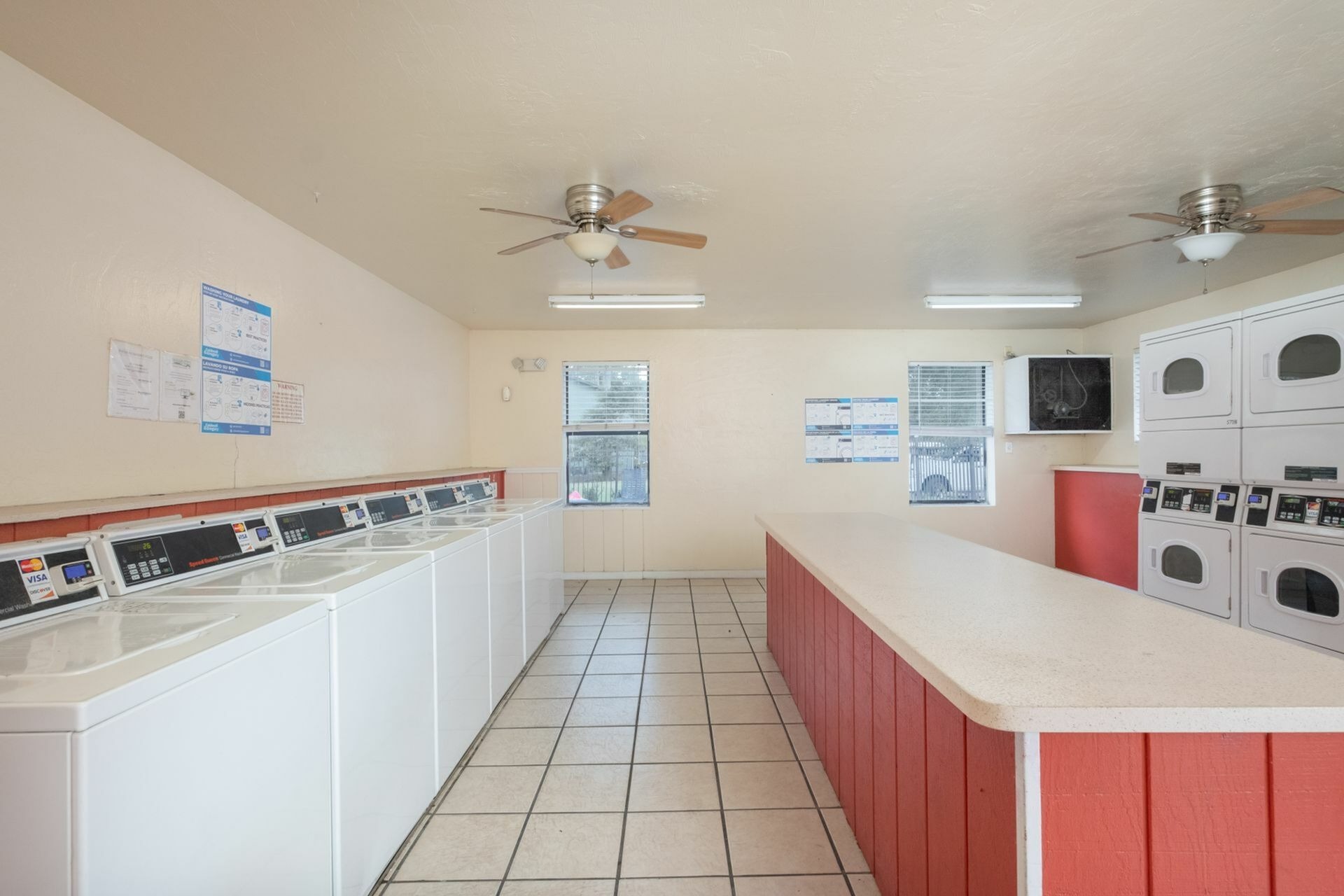 Laundry room with washers and dryers