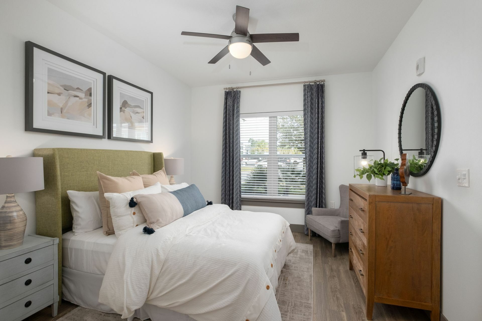 Bedroom with large bed and dresser