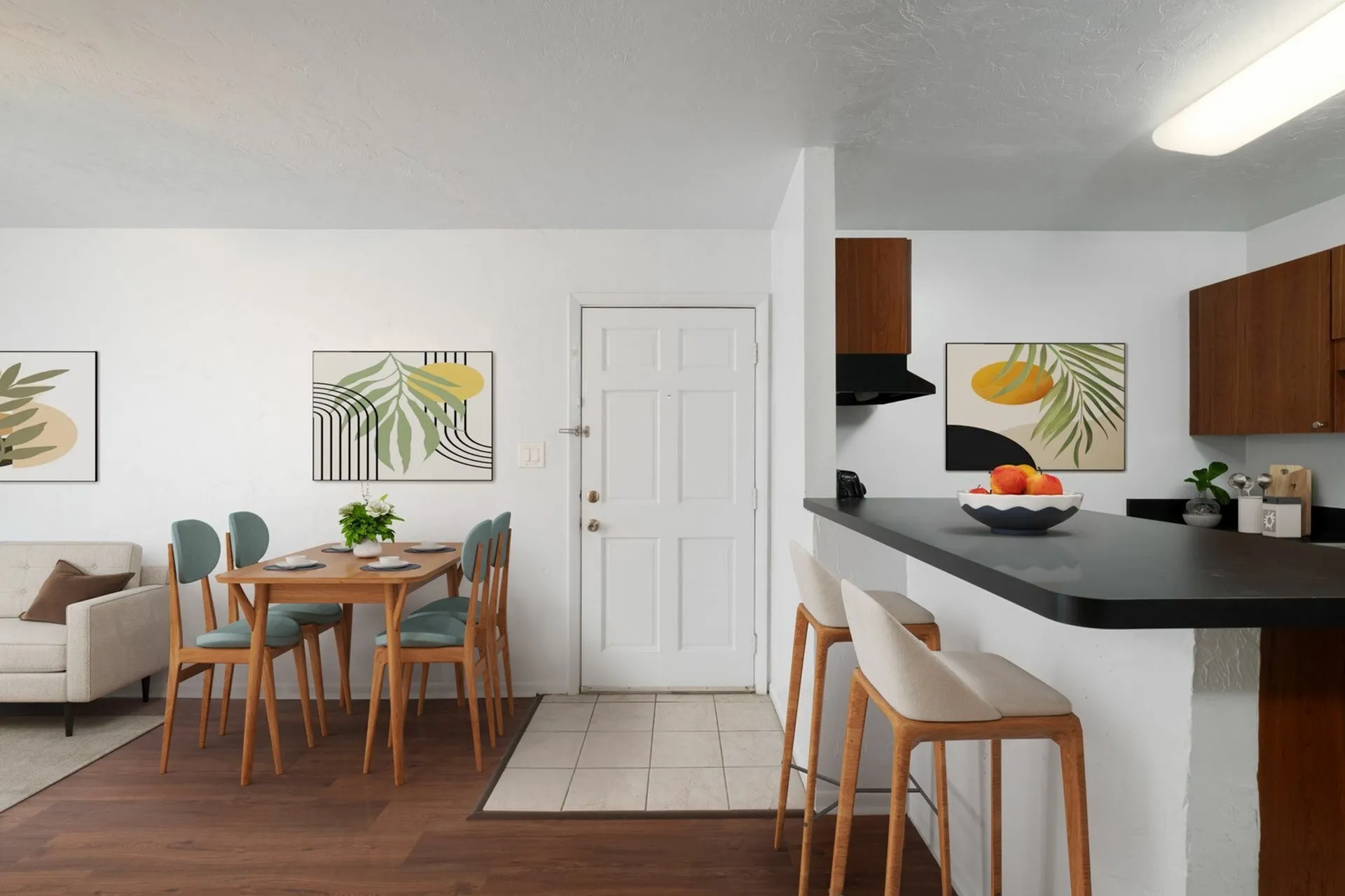 kitchen with breakfast bar and dining area