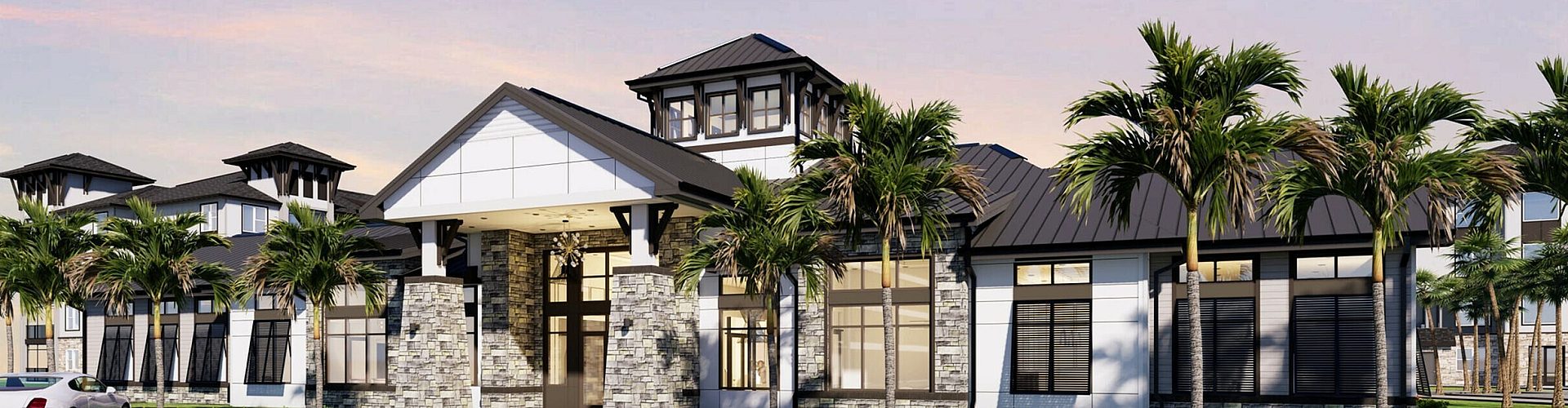 Elegant and modern apartment complex with a striking stone facade and lush palm trees under a serene sky.