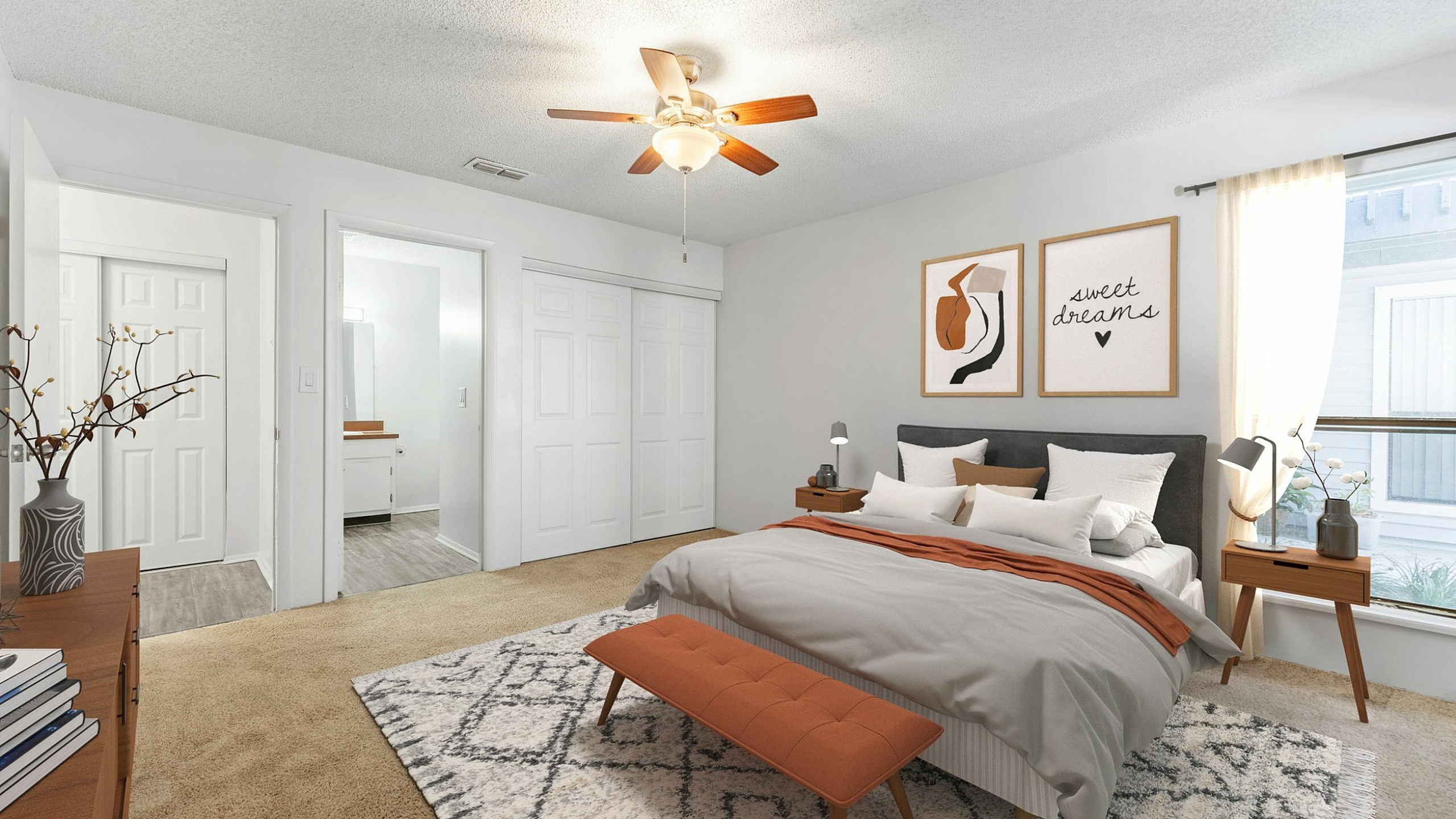 Inviting bedroom featuring a plush bed, modern accents, and soft lighting, creating a cozy retreat.