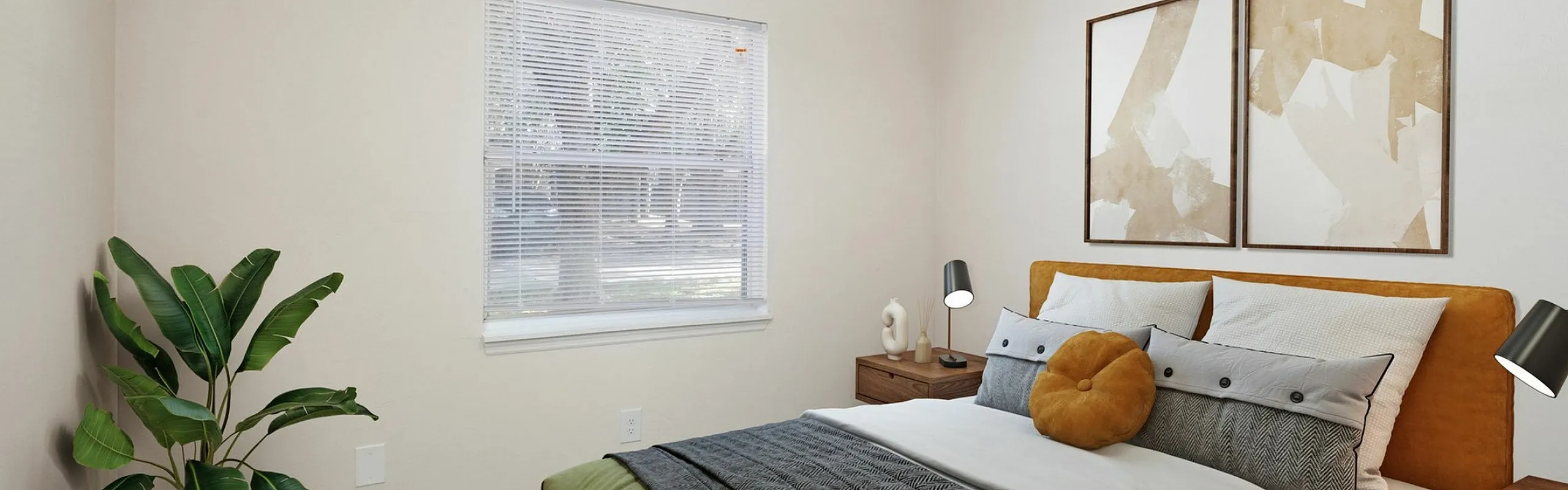 Chic bedroom with modern decor featuring a cozy bed, unique artwork, and a lush green plant by the window.