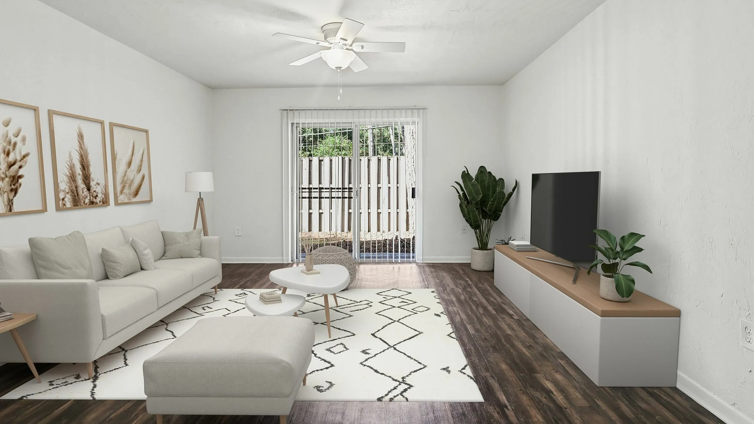 Bright and elegant living room featuring modern decor, comfortable beige sofa, sleek hardwood floors, and large patio doors for natural light.