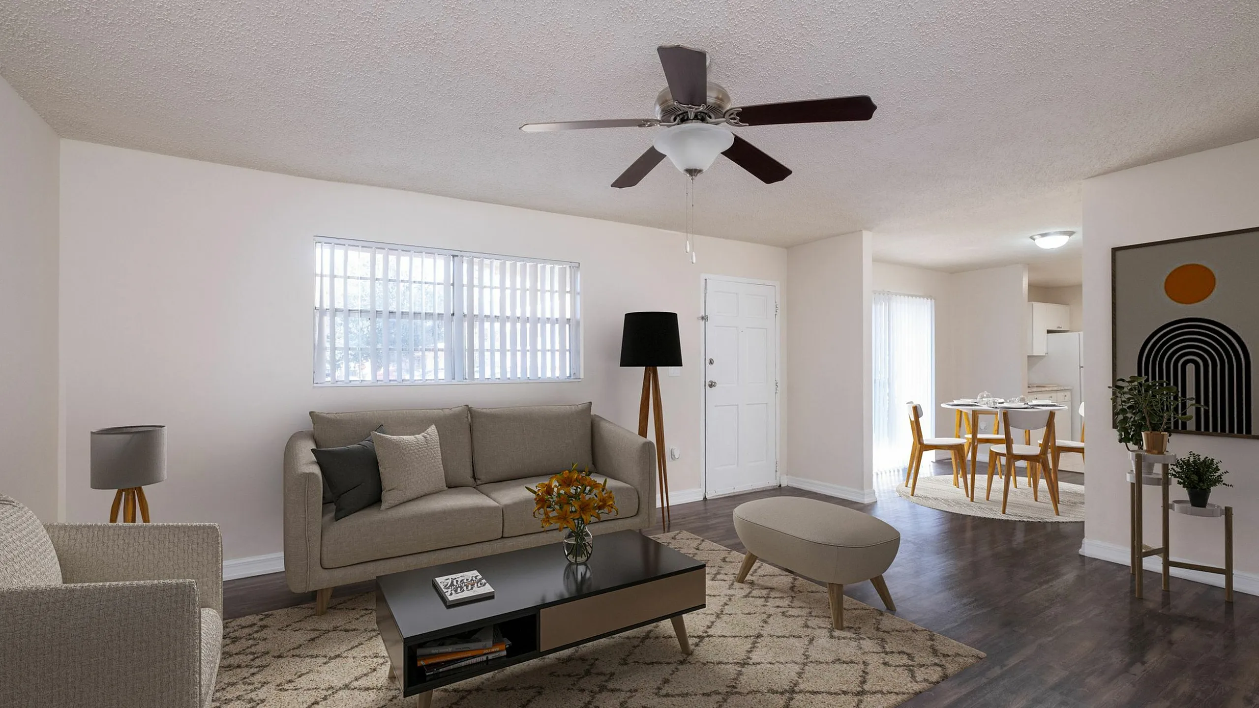 Contemporary living room with cozy beige sofas, modern decor, and open dining area featuring elegant wooden furniture and plenty of natural light.