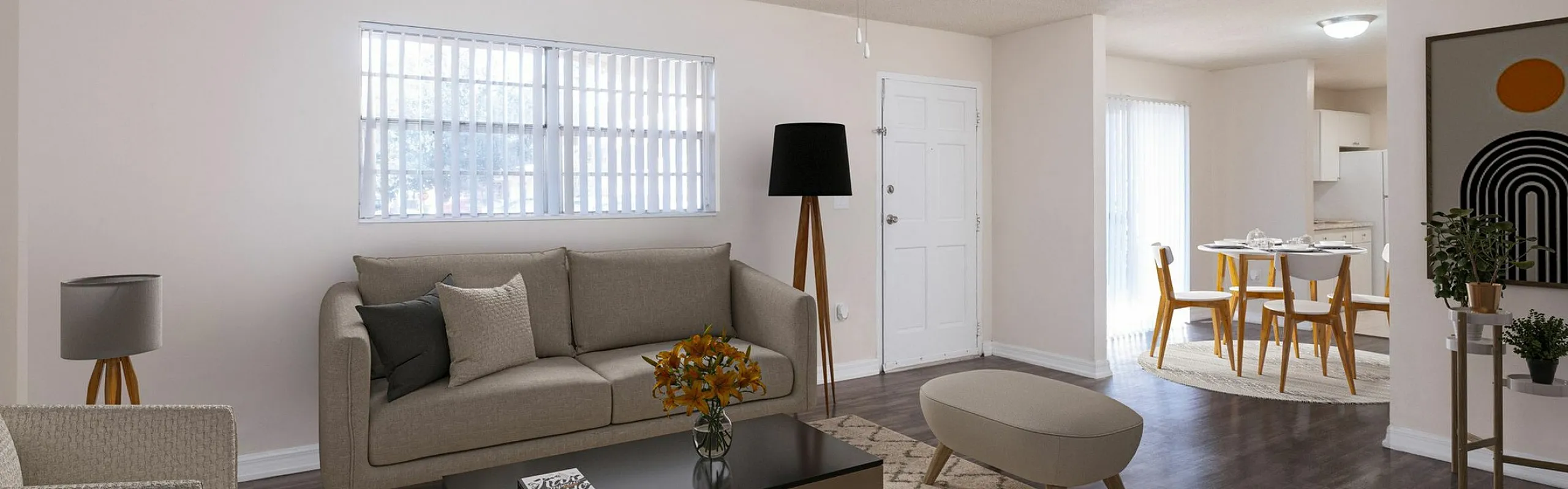 Chic living room with modern furniture, stylish ceiling fan, and adjacent dining area, perfect for entertaining.