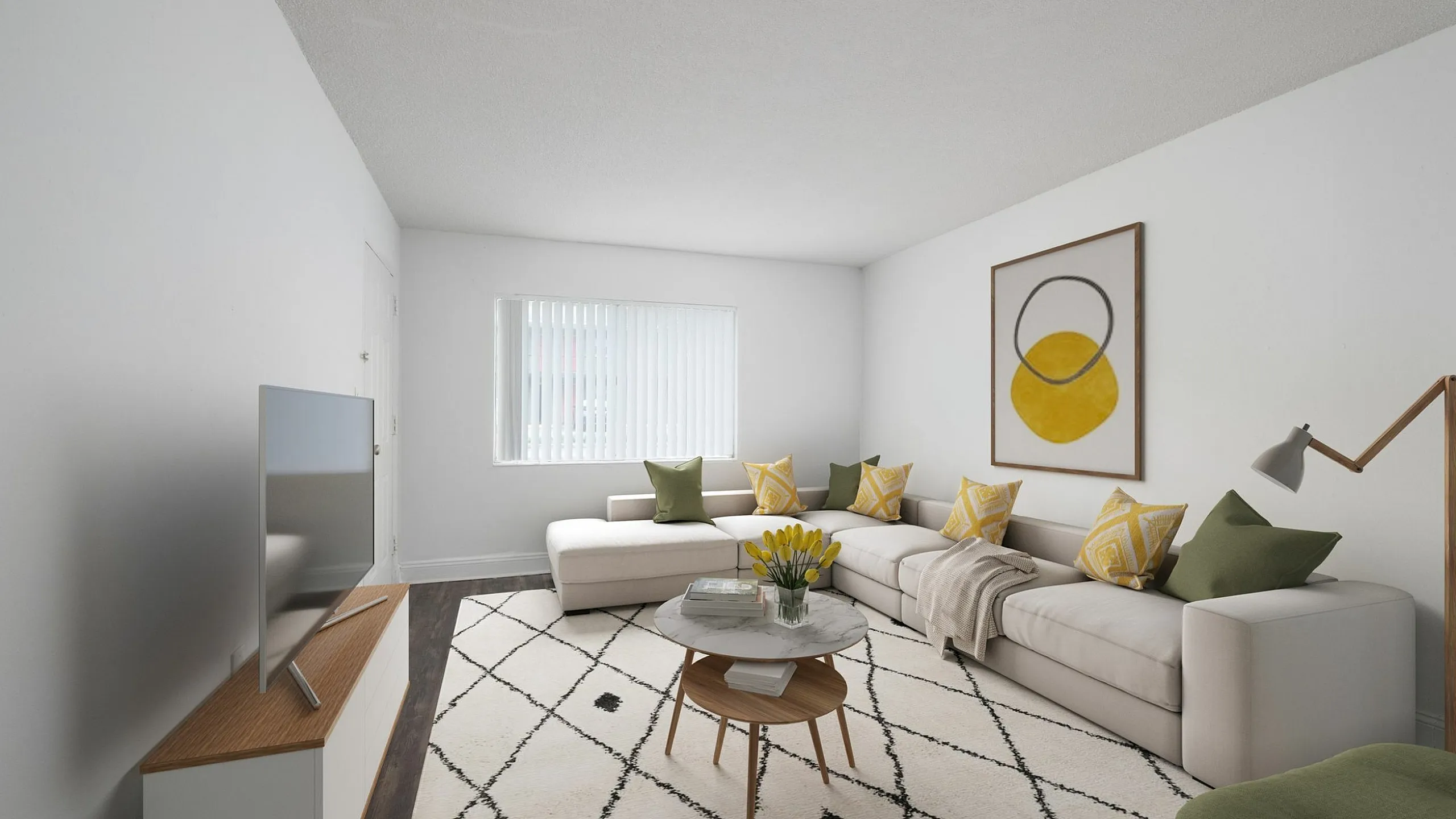 Elegant living room with a modern L-shaped sofa, stylish decor, and a large window for natural light.