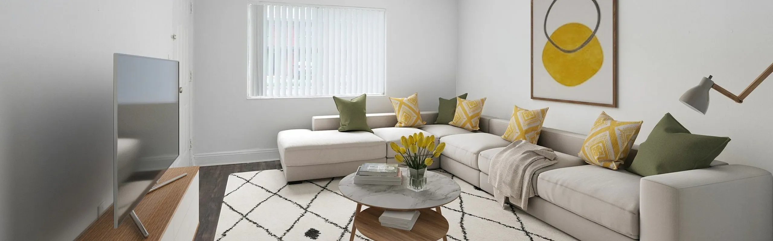 Bright and modern living room with elegant decor, featuring a cozy sectional sofa with vibrant cushions, stylish floor lamp, and sleek TV setup, perfect for relaxation.