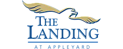 Elegant logo of The Landing at Appleyard featuring a stylized bird in gold, embodying sophistication and style.