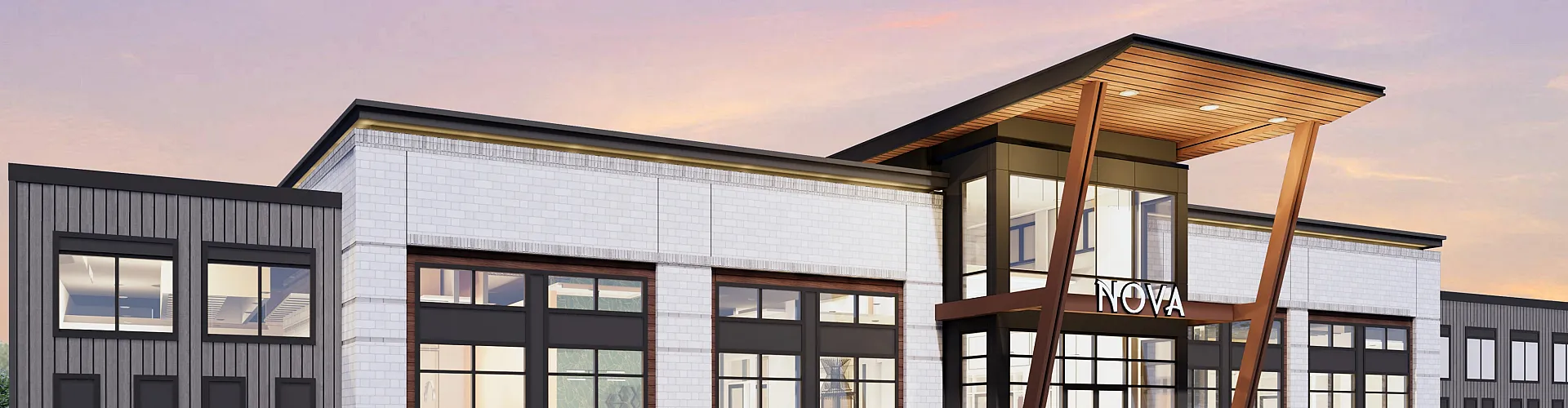 Modern architectural building facade with sleek design elements, expansive windows, and inviting entrance under a colorful evening sky.