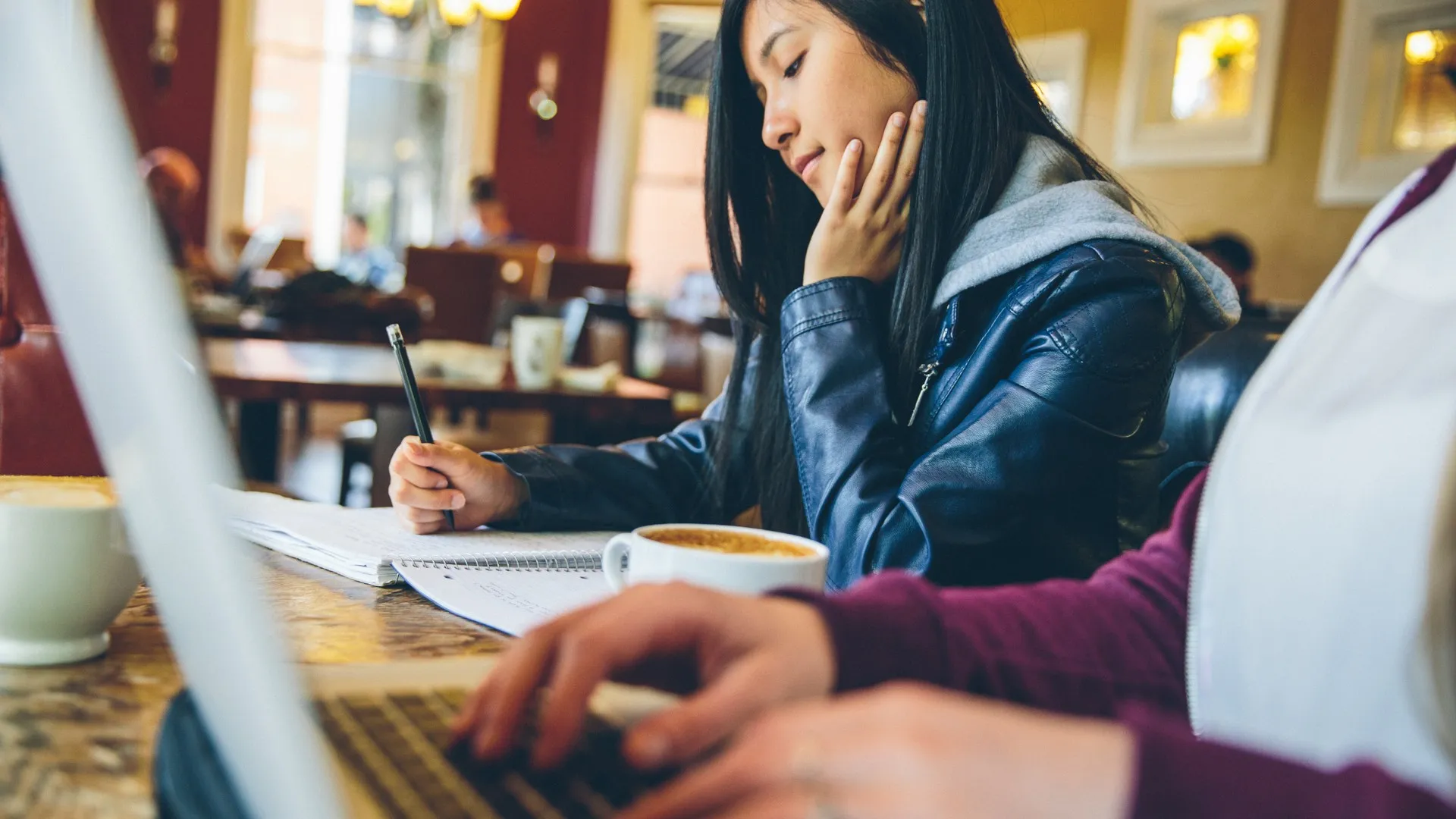 Residents Doing Homework in Study Lounge | Apartments Near Csu | Uncommon Fort Collins