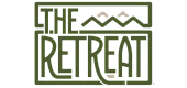 Elegant logo design for 'The Retreat' featuring stylized green text and abstract mountain elements.