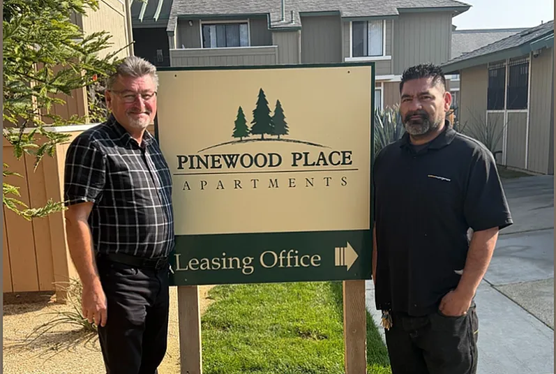 Welcoming atmosphere at Pinewood Place Apartments with friendly staff near the leasing office.