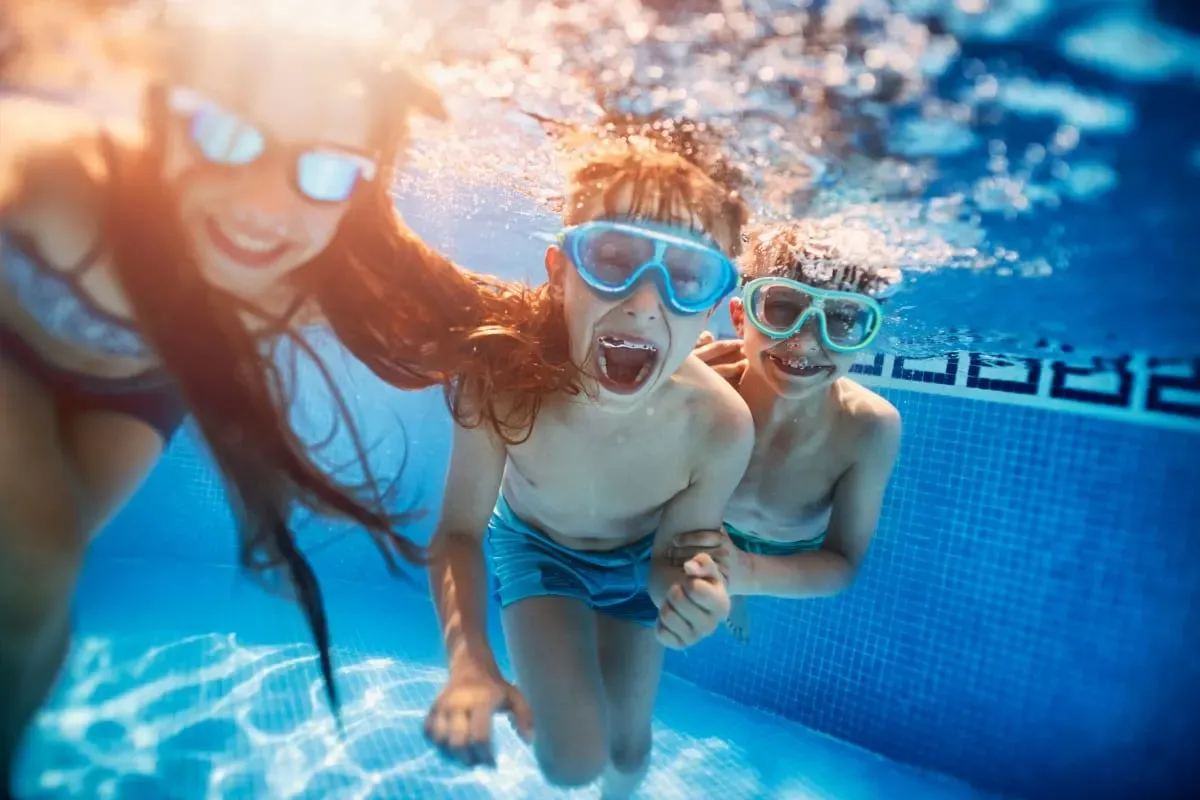 Kids swimming in pool