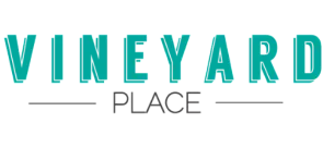 Modern logo for Vineyard Place featuring bold, turquoise lettering with a sleek design.
