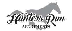 Elegant logo of Hunters Run Apartments featuring a silhouetted horse, symbolizing a blend of luxury and freedom in apartment living.