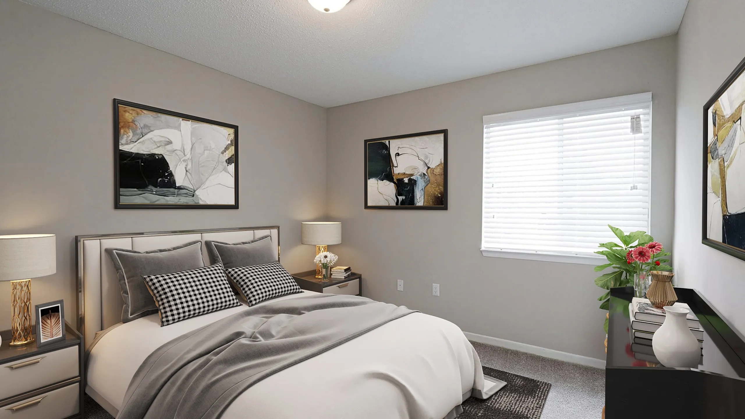 Elegant bedroom with chic decor, featuring a comfortable bed, stylish bedside tables, framed artwork, and abundant natural light.