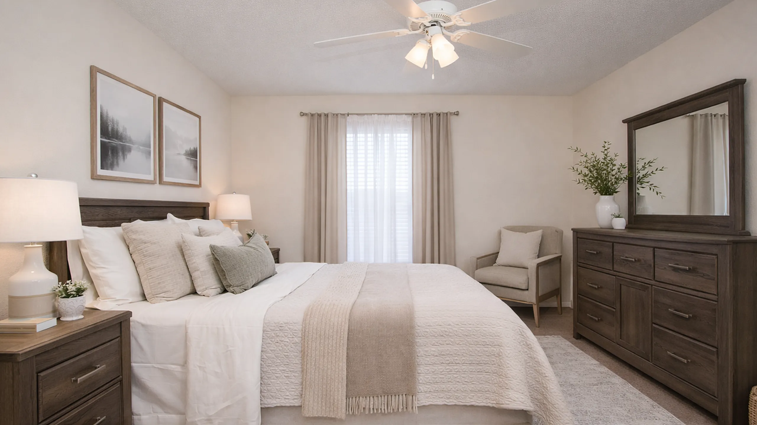 Elegant bedroom featuring a cozy bed with soft linens, warm wooden furniture, and a ceiling fan for comfort.