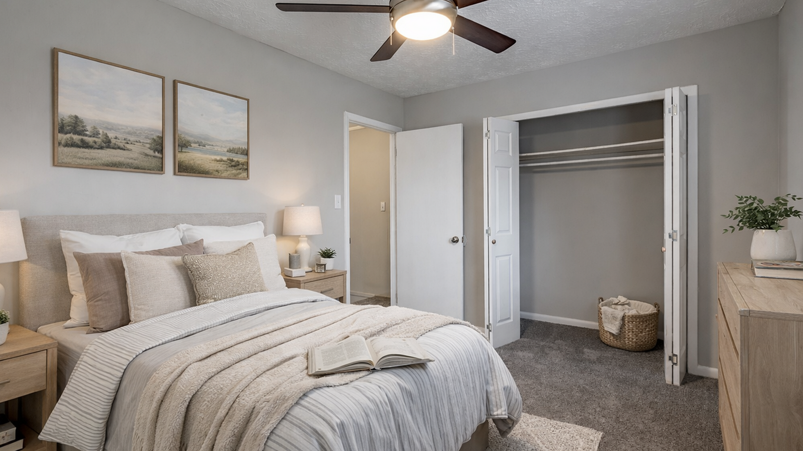 Inviting bedroom with cozy bedding, soft lighting, and ample closet space, perfect for relaxation and comfort.
