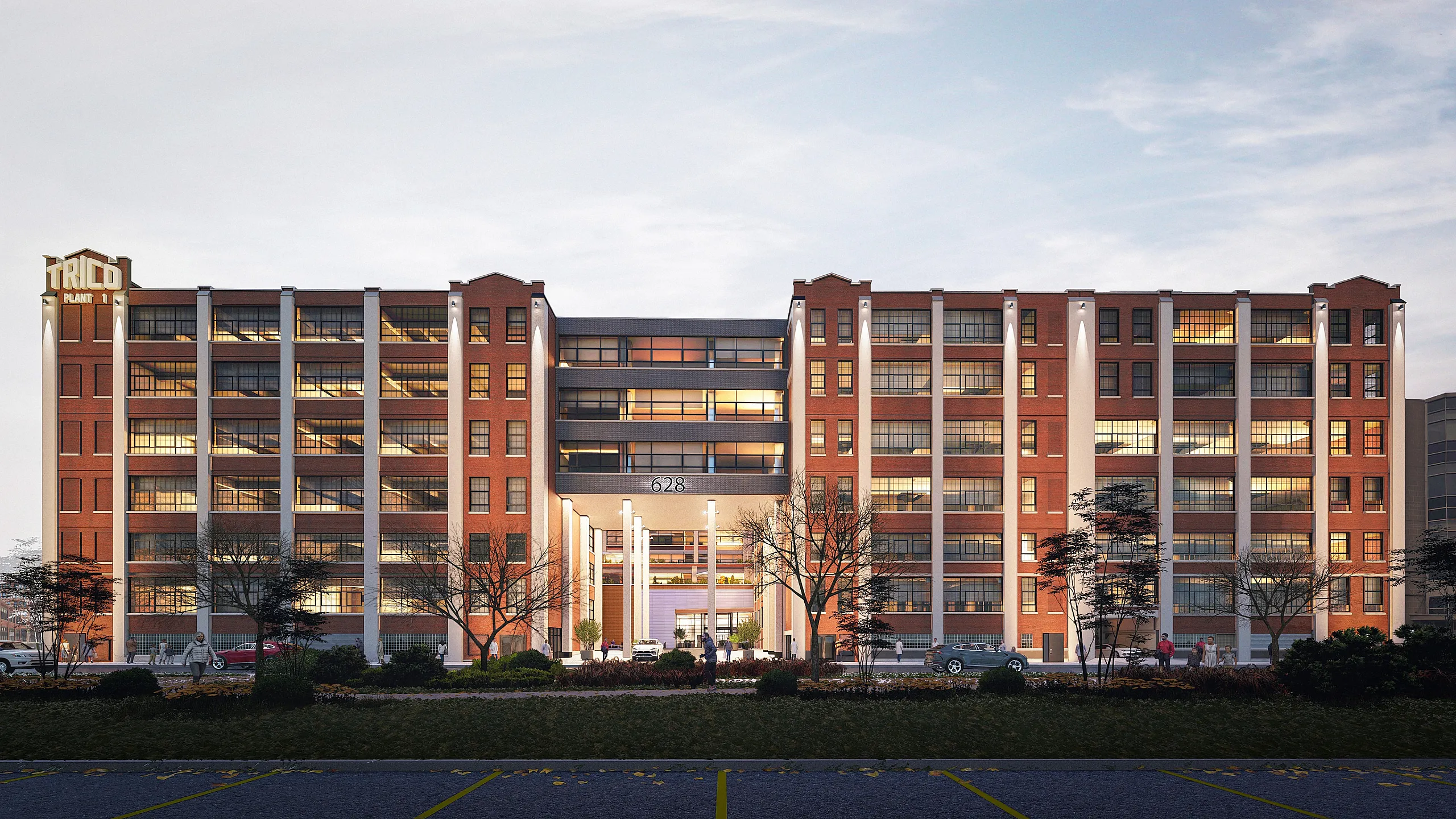 Modern loft-style apartment building with expansive windows, vibrant urban design, and inviting entrance, offering a stylish city living experience.