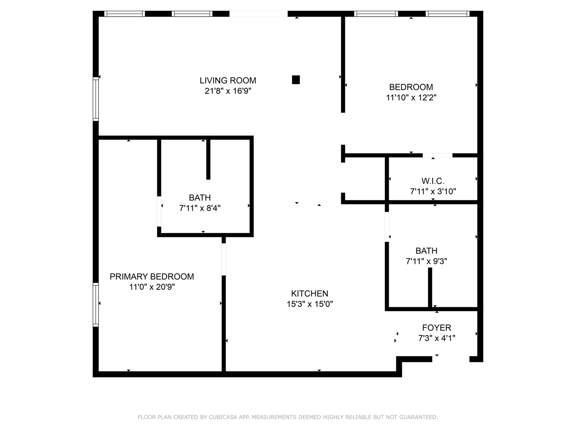 Contemporary floor plan showcasing a spacious primary bedroom, cozy secondary bedroom, expansive living room, and a big kitchen.