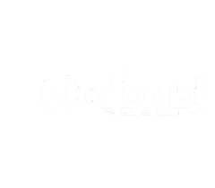 Oxford Realty logo with a red roof design and the slogan 'We Care. Our Residents Deserve It.'