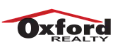 Oxford Realty logo featuring a bold red roof design over a sleek black text.