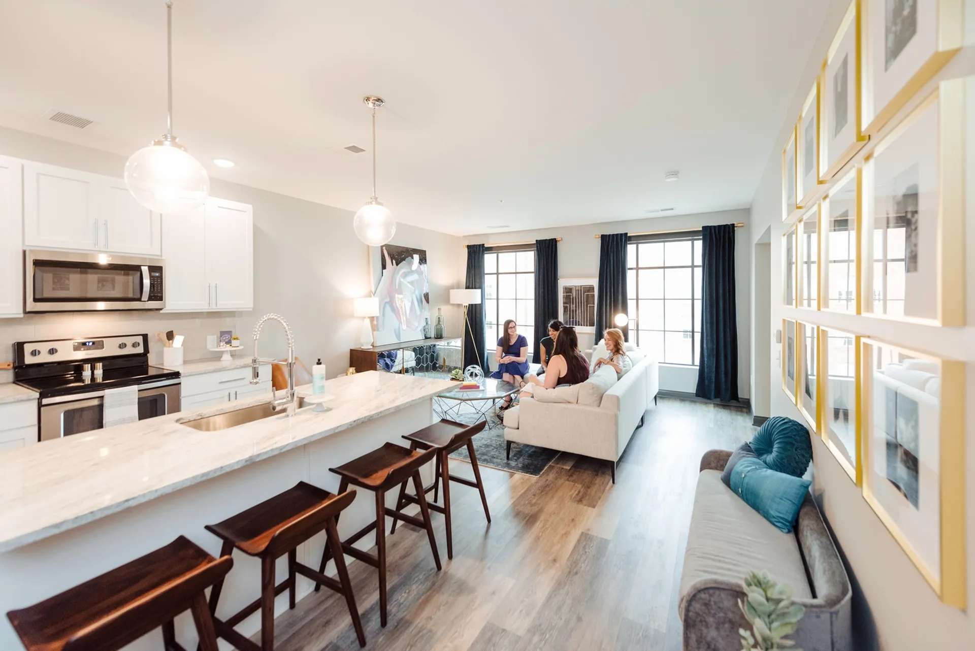 woman in luxury downtown apartment in lc riversouth apartments