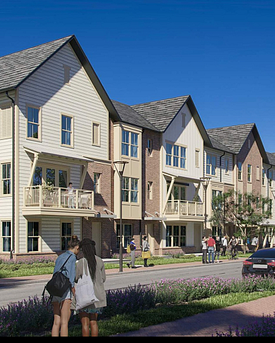 Beautiful row of modern townhouses with balconies, set in a vibrant, green community with people enjoying outdoor activities.