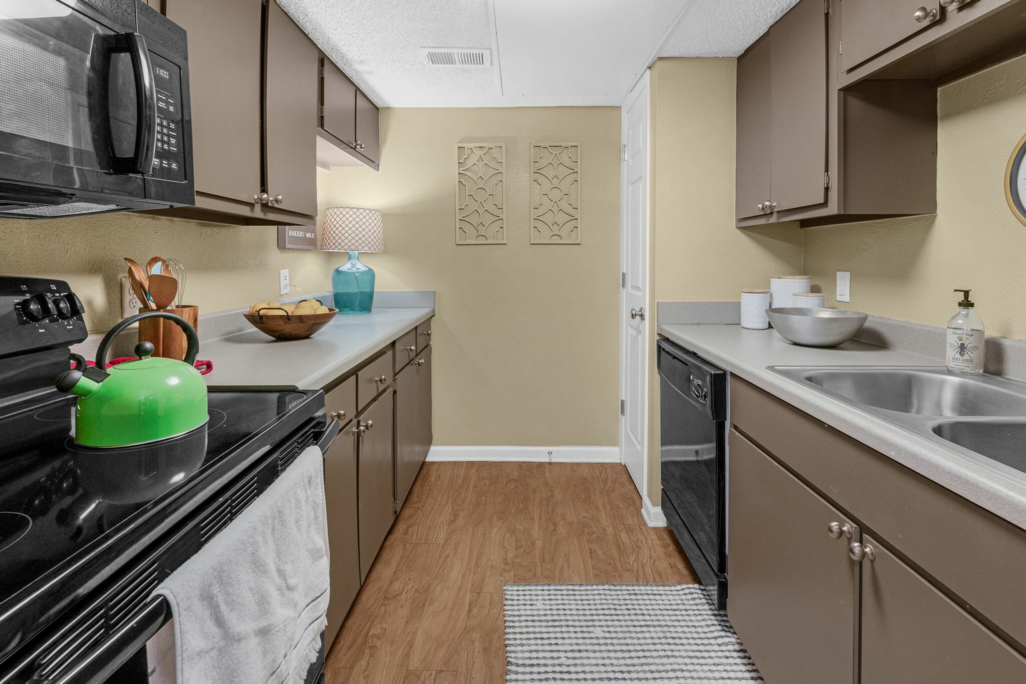 Galley style kitchen with plenty of storage