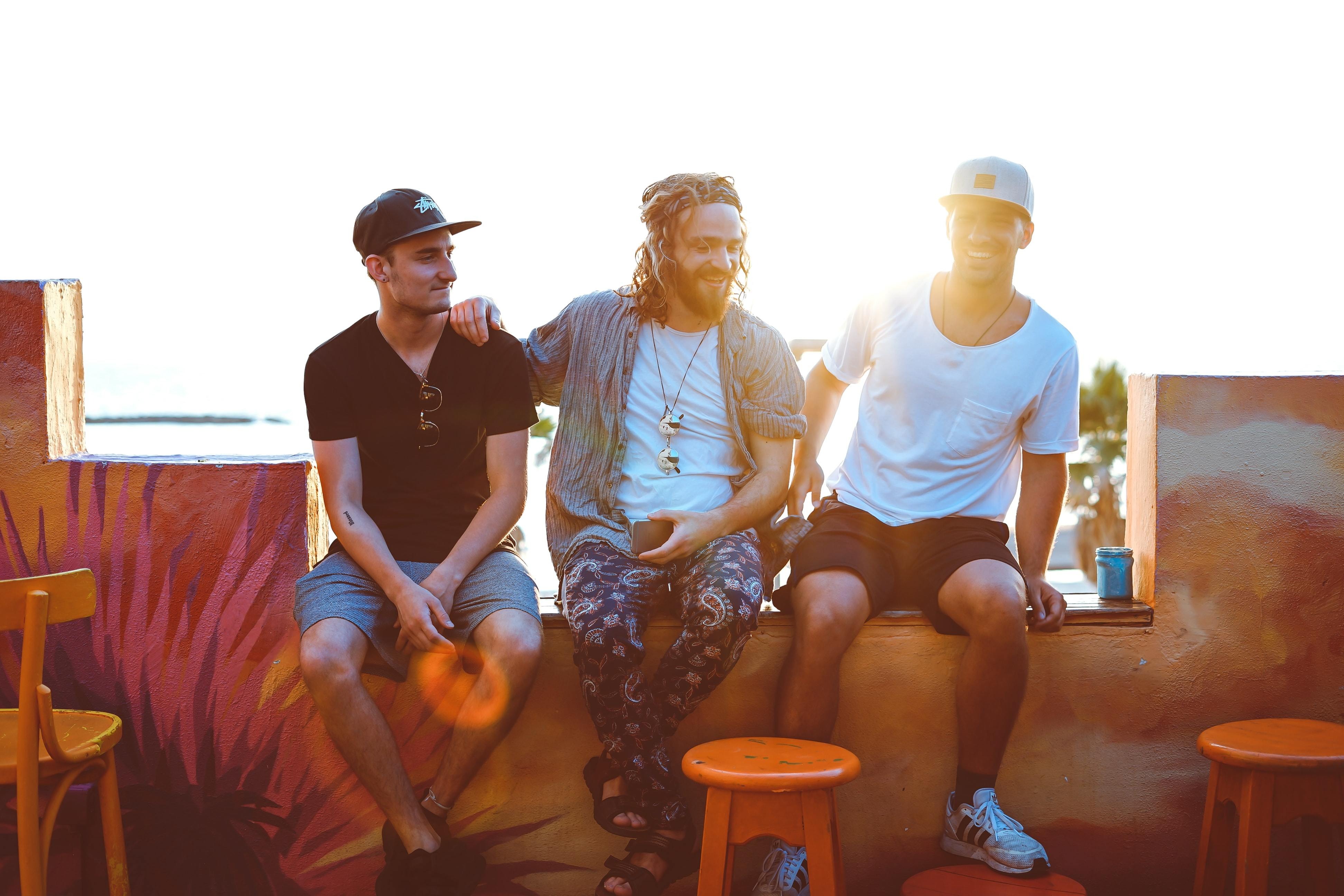 friends enjoying each other company on a rooftop setting outdoors