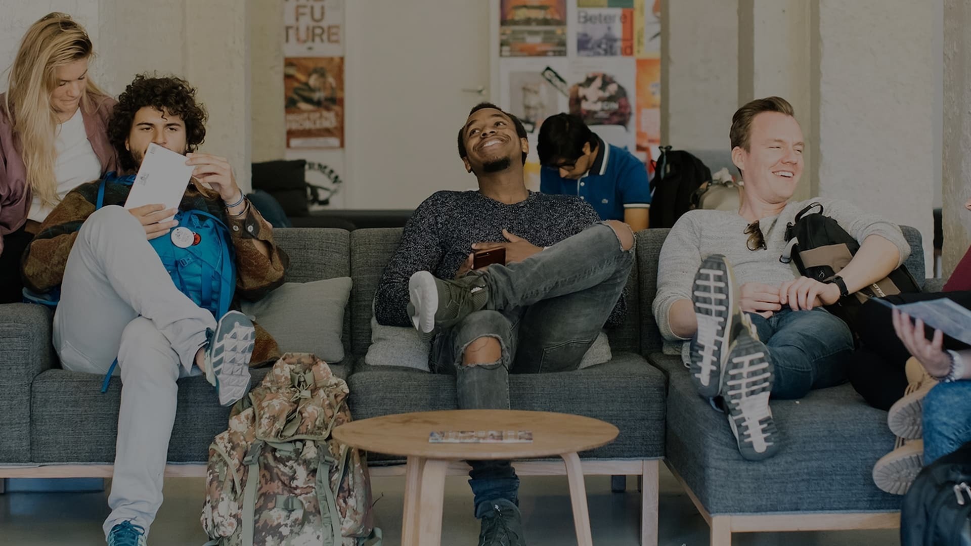 students hanging out on a couch