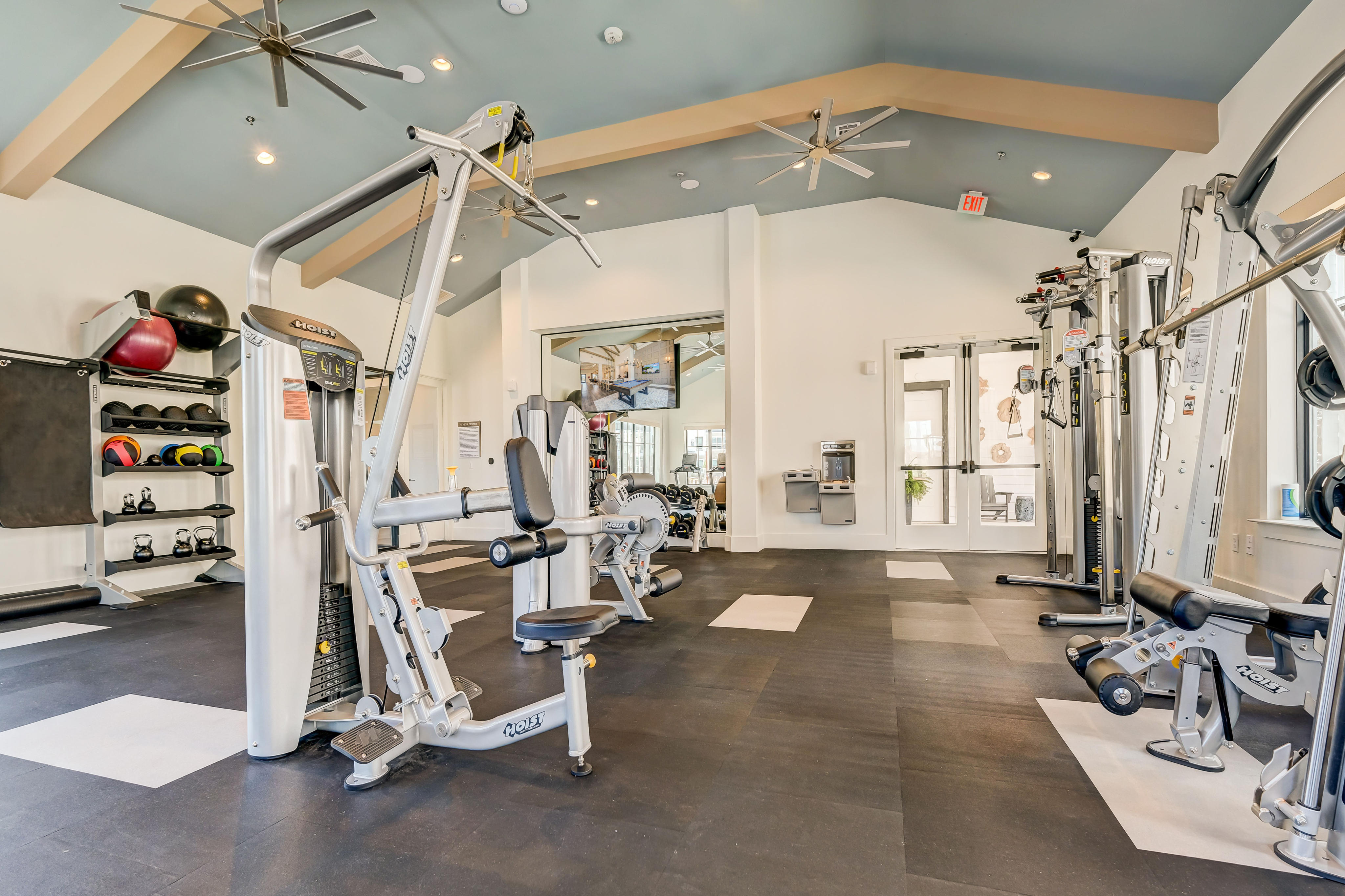 Fitness center with cardio and strength training machine