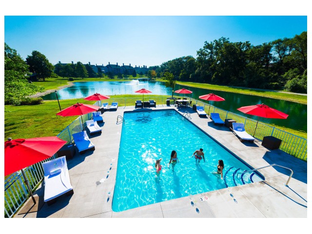 The Woodland Mews Swim Club with Resort-Style Pool and Tanning Deck