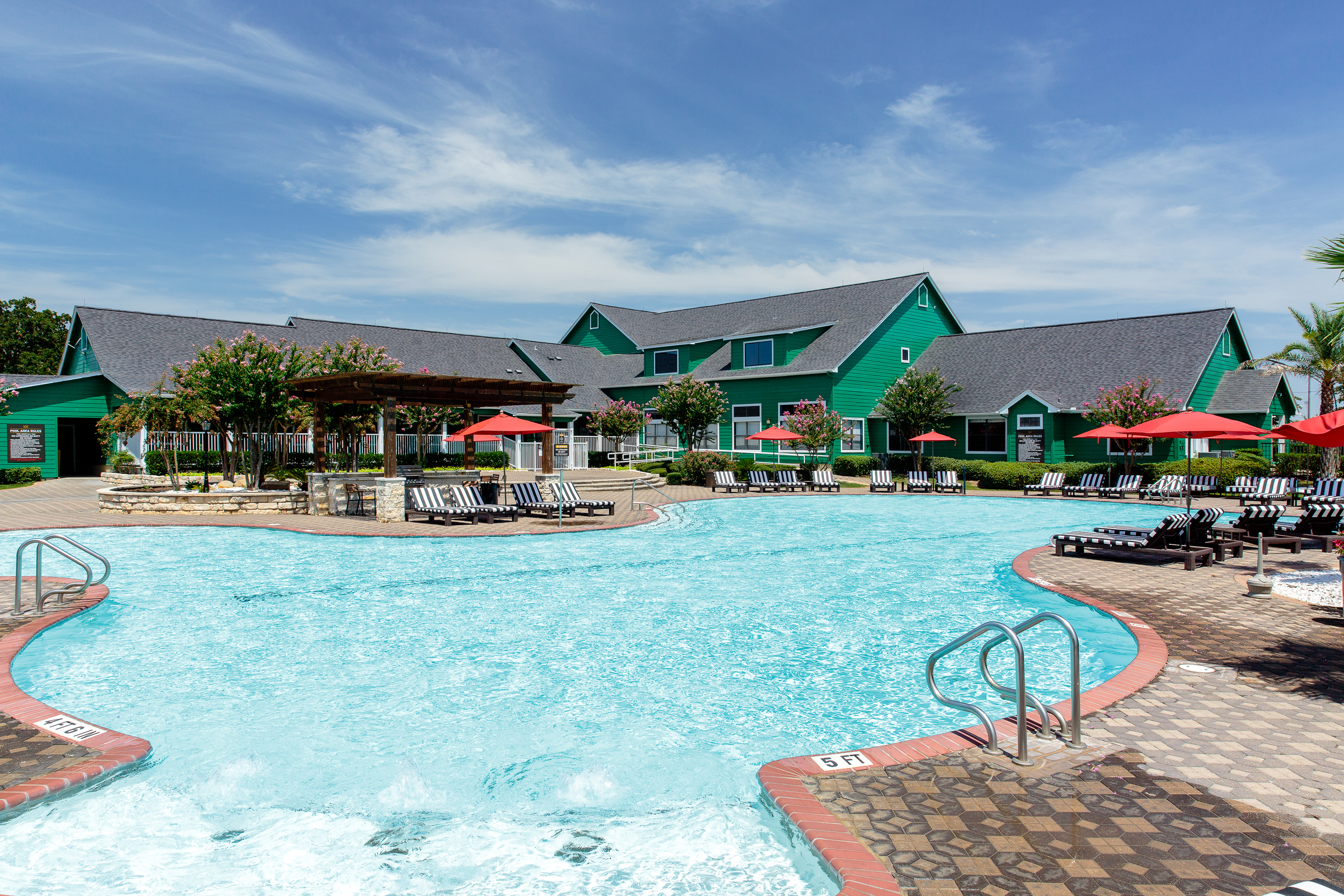 Image of The London Swim Club Featuring a Resort-Style Pool, Tanning Deck and NEW Furniture for The London
