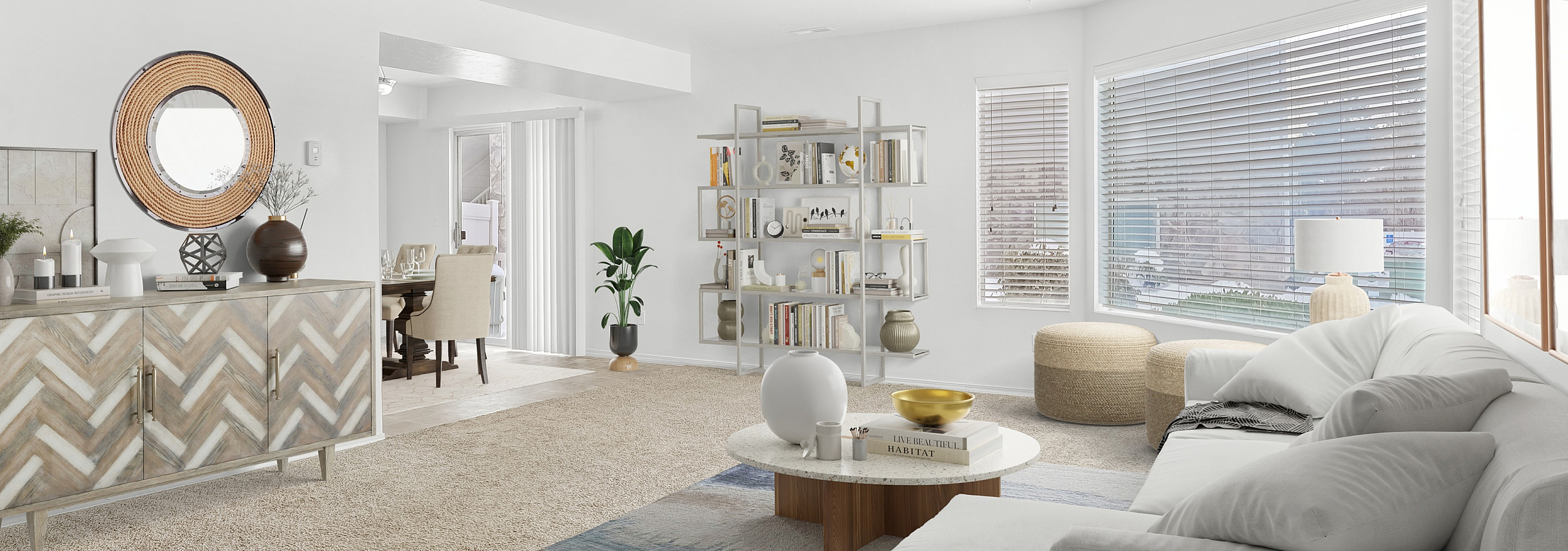 Bright and inviting living room with modern decor, spacious layout, and abundant natural light streaming through large windows.