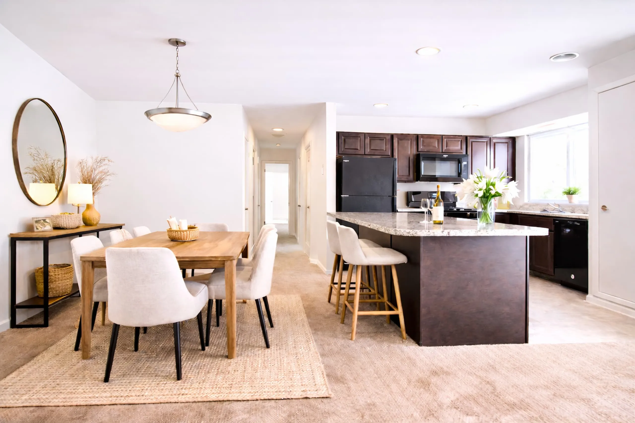 Separate Dining Areas. Open Kitchen.