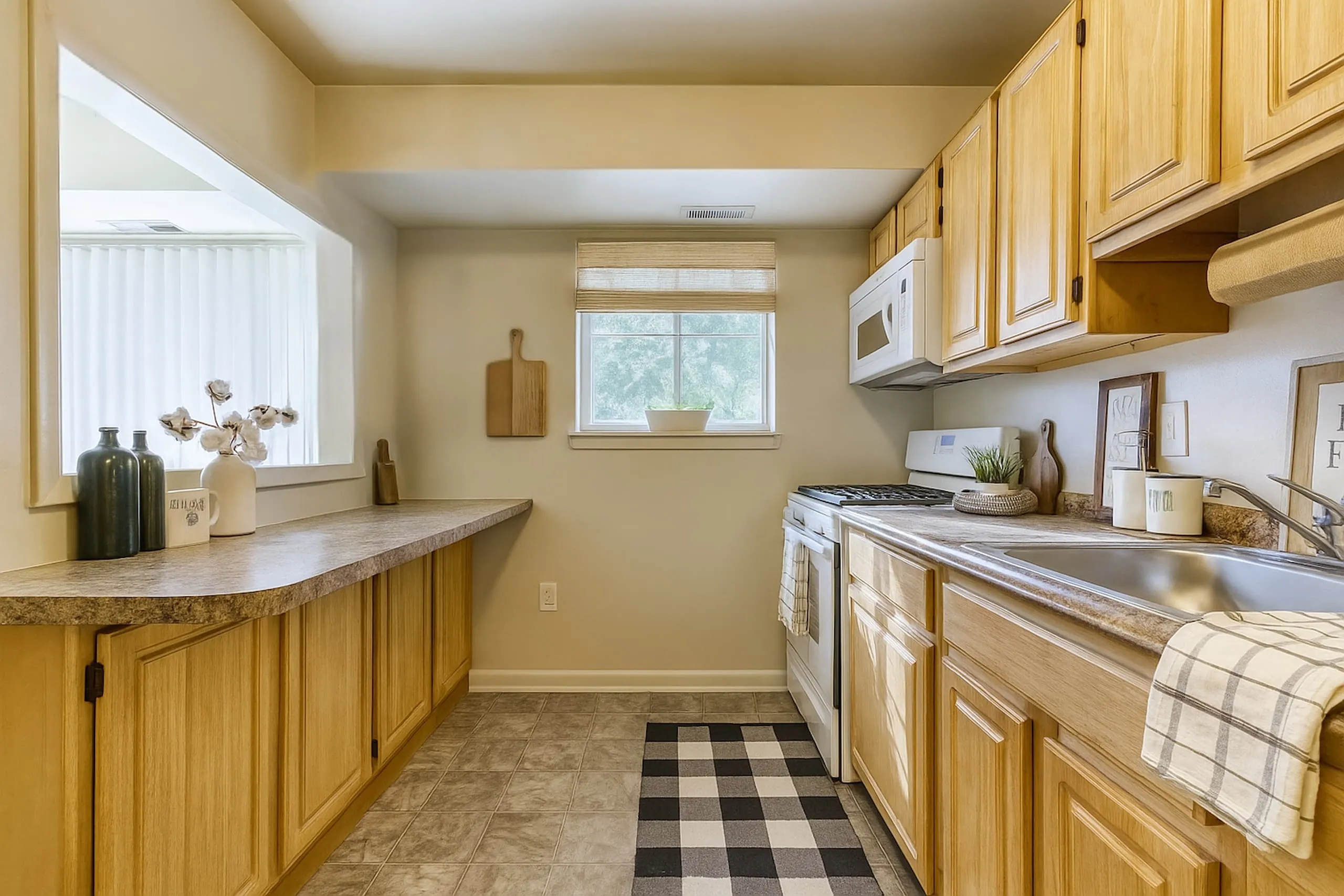 Kitchen with pantry storage and breakfast bar