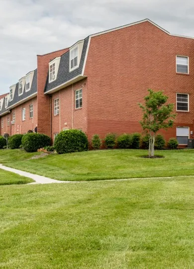 corner view of apartment building at middle branch