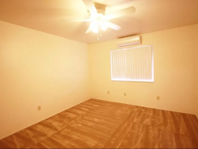 2-Bedroom single story townhome master bedroom wiht spit air conditioning