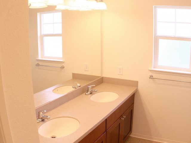3-bedroom two story multiplex townhome on FTSH, large master bath with shower and soaking tub