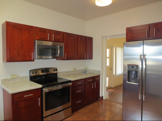 4-Bedroom Senior Officer Home on Schofield Barracks, ktichen with cherry canbinets and stainles appliances