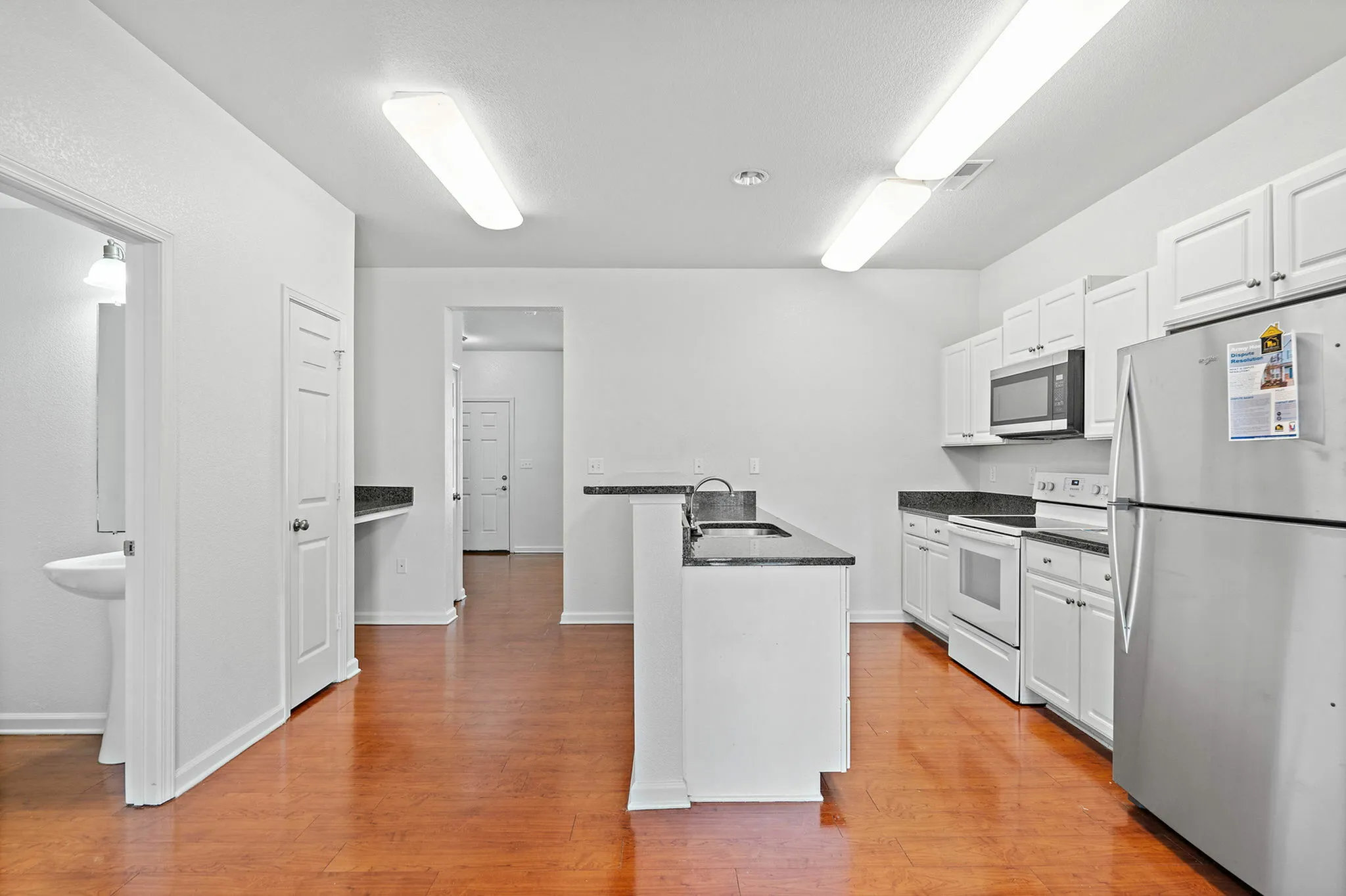 Kitchen with stainless appliances and granite countertops