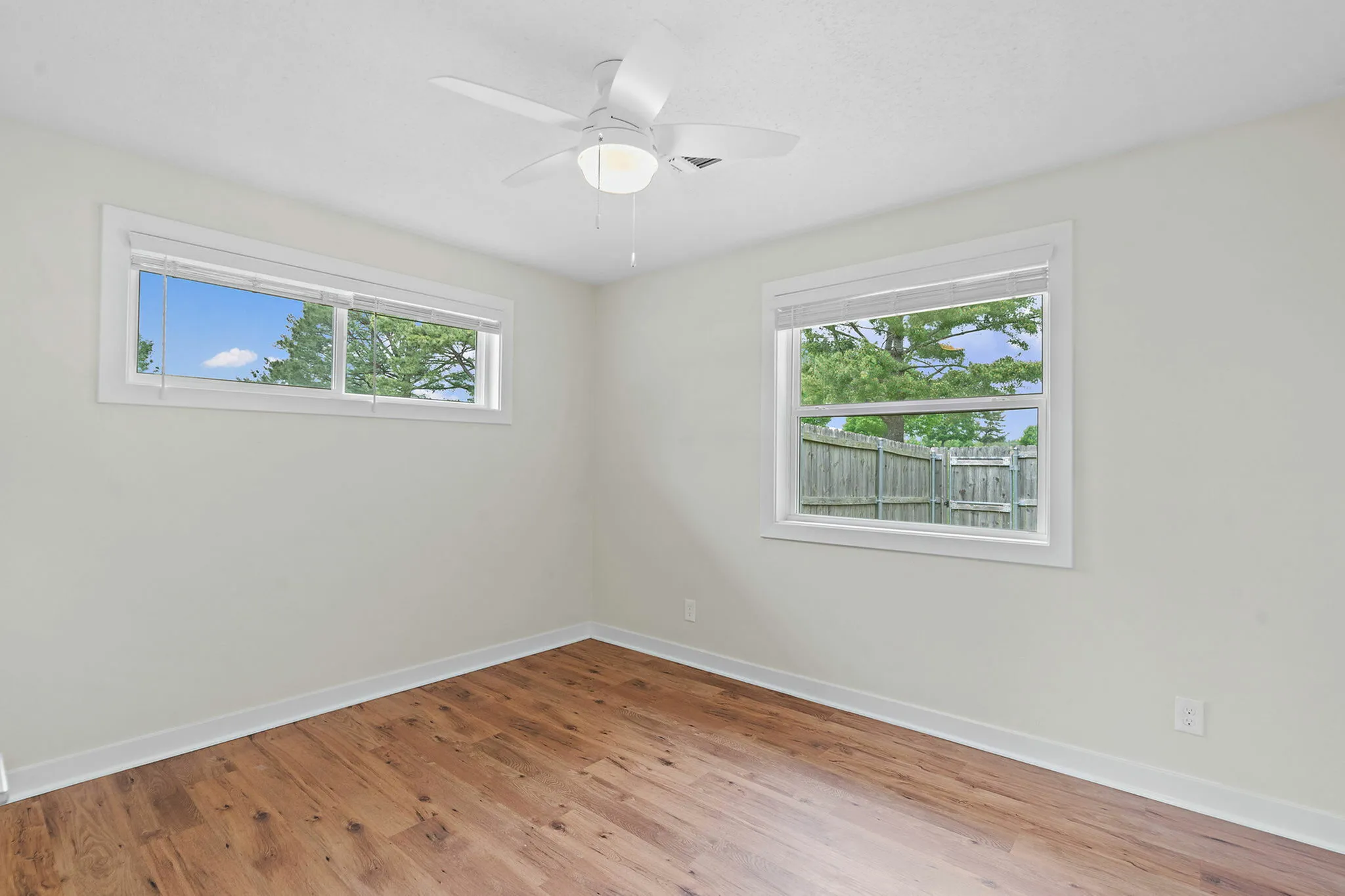 Bedrooms offer ample space and natural light