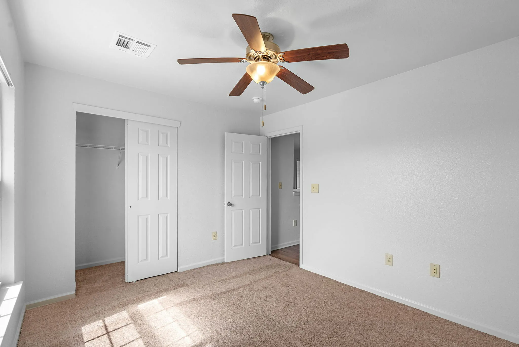 All bedrooms offer ceiling fans and large closets