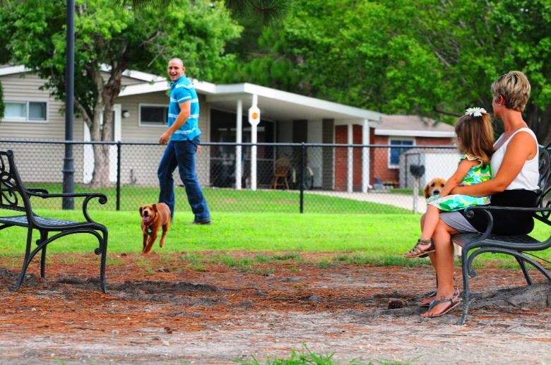 Pet Friendly Neighborhood | Park Bench | Family Playing Outside